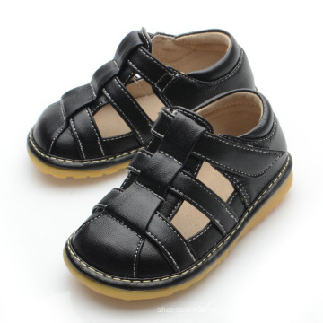 Solide schwarze Baby Squaky Sandalen L132